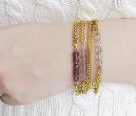 Bead Bracelet Stack in Transparent Shades of Purple on Gold Chain